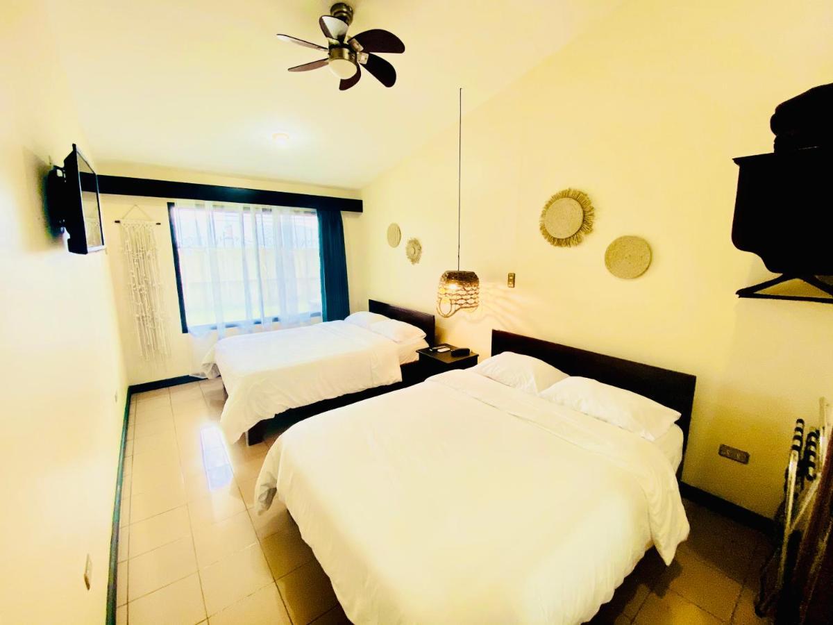 Hotel Mango Airport Río Segundo Eksteriør billede