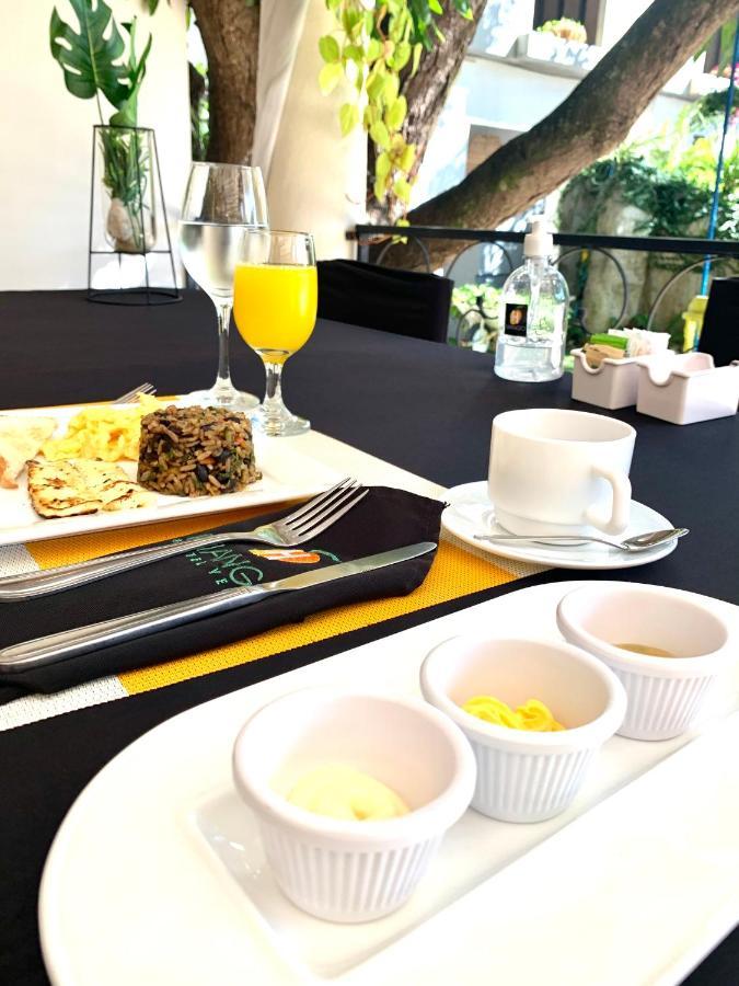 Hotel Mango Airport Río Segundo Eksteriør billede